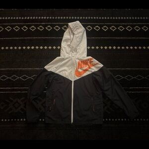 Nike Kids' Black and White Raincoat with Orange Accents